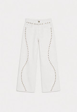 Jeans with wavy studs on the front and waist