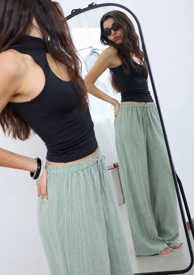 Linen-effect trousers with glitter stripes green