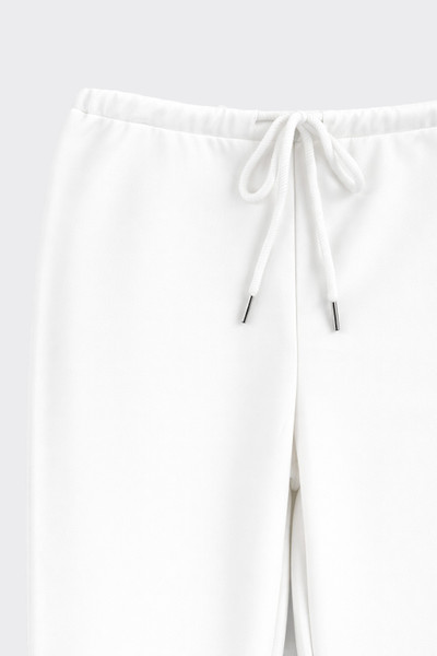 Bell bottom trousers white