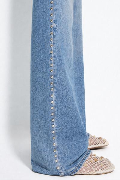 Straight jeans with studs and stars