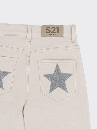 Jeans with glittery stars and stars on the back beige