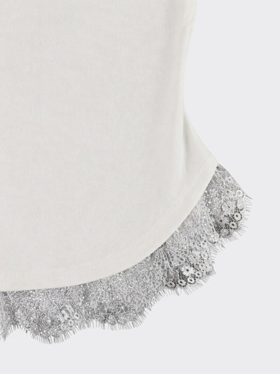 Strappy top with lace trim at the hem