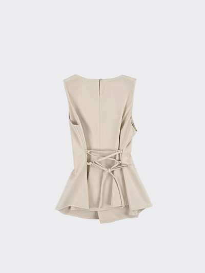 Taupe peplum top fitted at the back