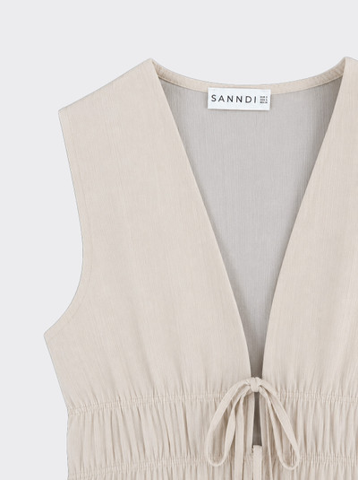 Pleated top with ties in front beige