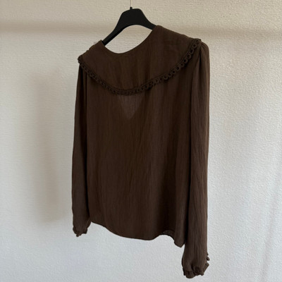 Blusa fluida de volantes