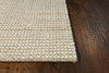 7'x10' Ivory Hand Woven Wool And Jute Indoor Area Rug