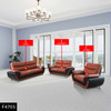 Black and Orange Faux Leather Sofa with Accent Chairs Ottomans and Padded Back