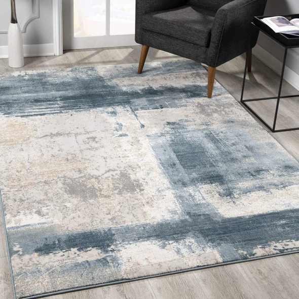 9 x 12 Cream and Blue Abstract Patches Area Rug