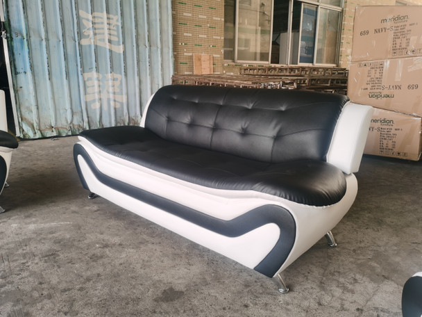 Black and White Faux Leather Sofa with Tufted Back and Chrome-Finished Legs