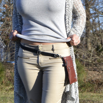Oxford Belt: This is why the Oxford Belt was designed... to be worn as a belt.
Belt extends 25"-50". (The 2 Hip Klips and Pocket Accessory add 8" to the circumference).
Model has 26" waist and 32" hips. Belt is extended at 27" in image shown.