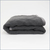 Tuc Fleece Weighted Blanket folded on white background.