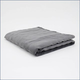 Tuc Kids Cool Weighted Blanket folded on white background.