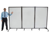 Man standing beside a three-panel wheeled whiteboard divider on a white background.