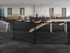 Indoor agility course with ramps, cones, and platforms set up in a large open room.