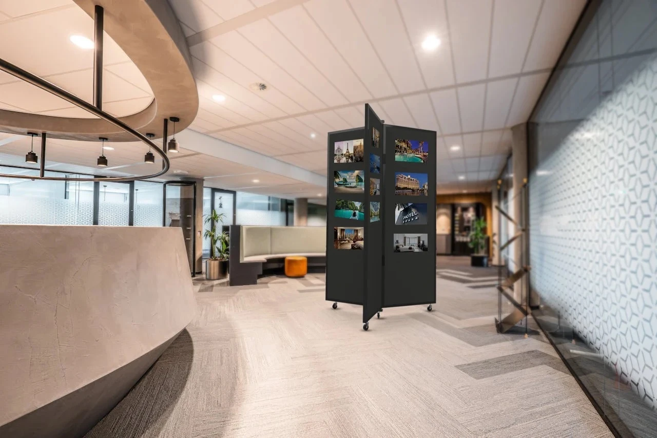 A black Display Tower presents church information in a lobby area.