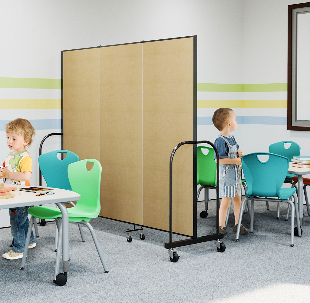 A tan Screenflex portable room divider separates activity tables as two children play in an early childhood classroom.