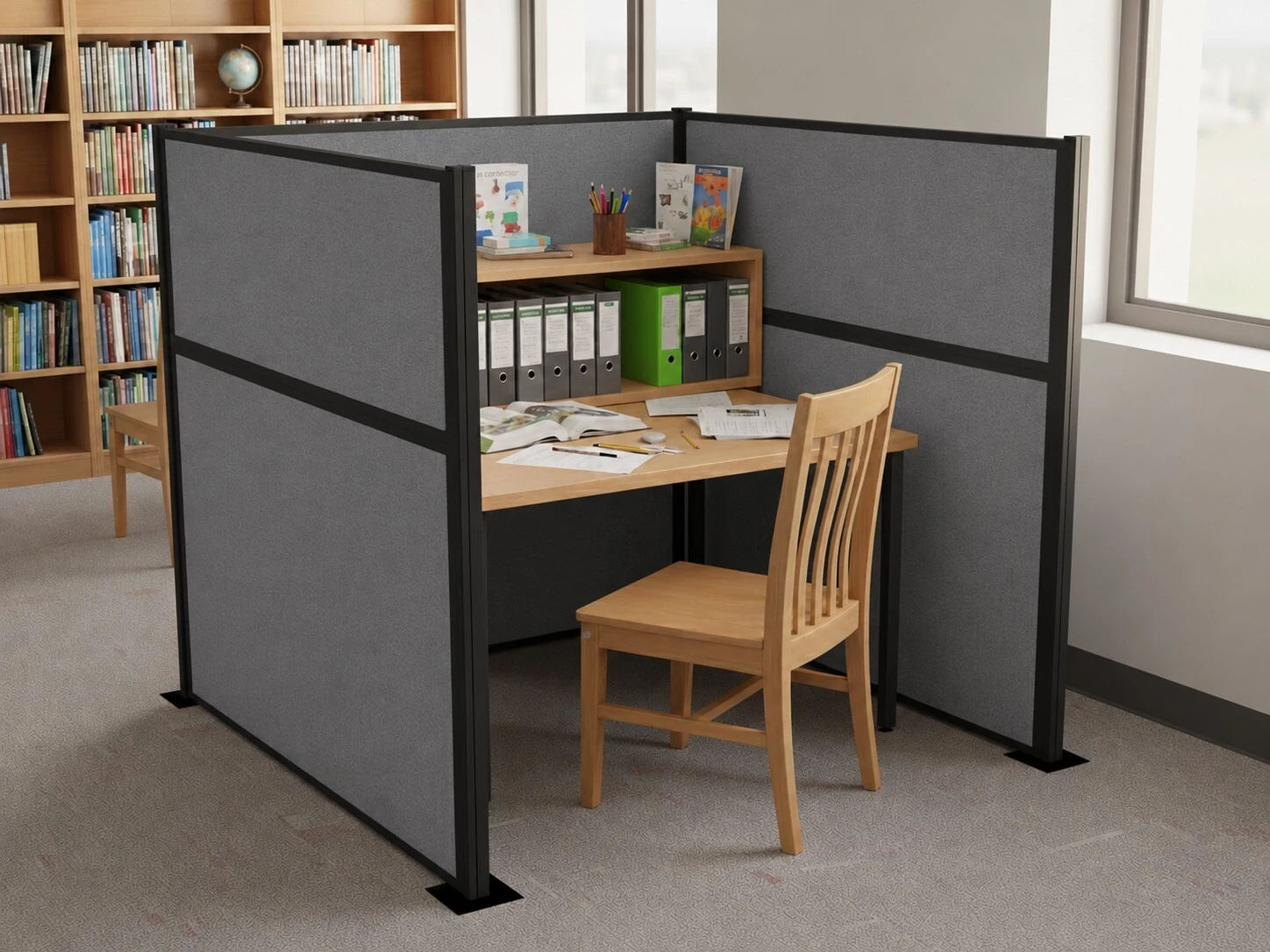Screenflex gray privacy partitions creating a quiet study workspace in a library.