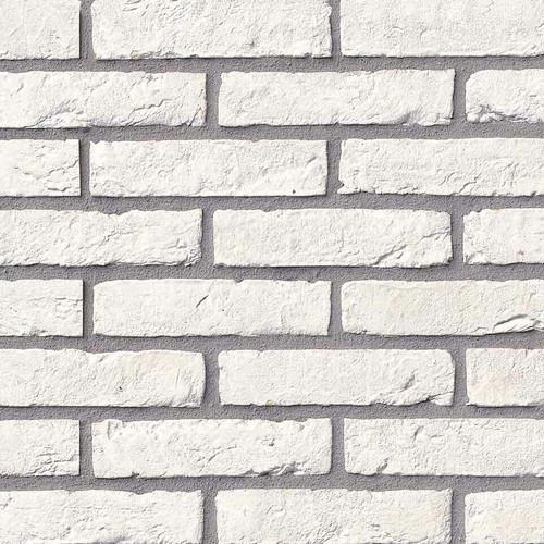 A bright white handmade textured facing brick. A bright white handmade textured facing brick.