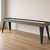 Olhausen Maverick Shuffleboard smoke on maple finish in a simple room setting