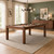 Olhausen Townhouse Pool Table in Van Dyke brown in a modern dining room