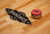 Brunswick Soho shuffleboard wood playfield with Brunswick Logo and included shuffleboard puck