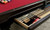 Olhausen Southern pool table storage drawer open with cues and balls