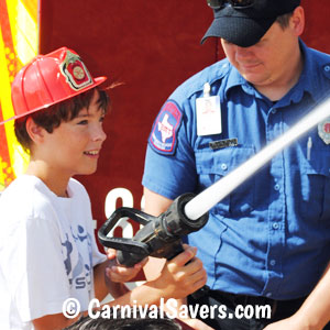 boy-spraying-firehose.jpg