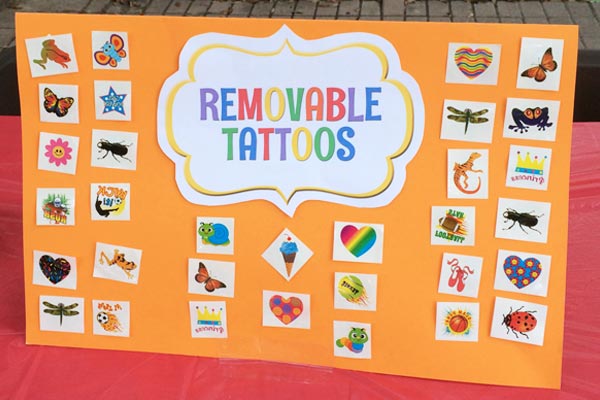 Super cute example board with text Removable Tattoos for a carnival face painting or tattoo booth