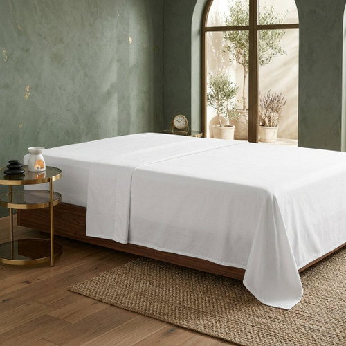 180-thread-count-flat-sheet-on-bed-white-polycotton