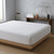 white-quilted-mattress-protector-fitted-on-bed-showing-diamond-quilted-pattern-and-secure-fit