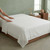 144tc-100-cotton-flat-sheet-on-bed-white-institutional