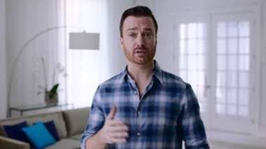 A man dressed in a plaid shirt explaining about the expectation in second week of quit