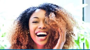 A happy woman after her quit journey