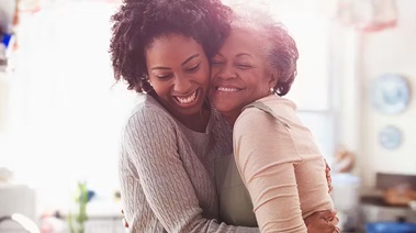 a couple of women smiling