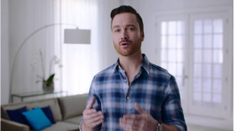 A man dressed in a plaid shirt explaining about how to tell if no longer addicted