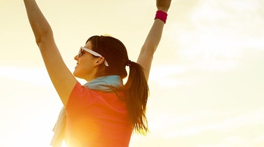 a person with the arms raised