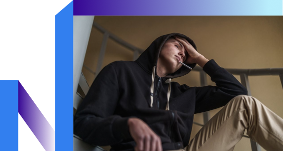 Stressed man smoking a cigarette