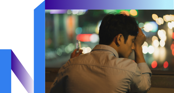 Tired man holding a cigarette