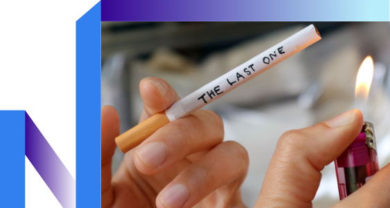 A person holds a cigarette labeled 'the last one', symbolizing a final choice.