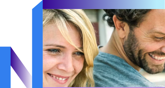 A man and woman smiling together