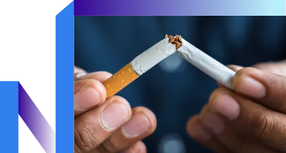 A hand with a cigarette, symbolizing a brief pause in a busy day.