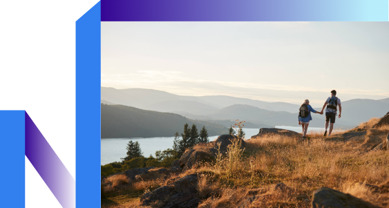 Healthy couple hiking near a lake
