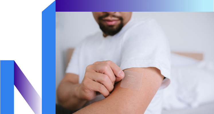 Man with nicoderm patch on arm