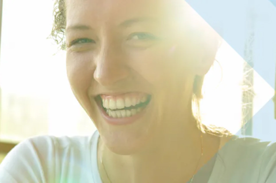 A young woman smililng