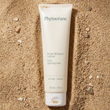Fresh Cleansing Foam laying in a pile of sand.