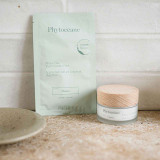 Targeted Dark Spot and Complexion Individual Sheet Mask next to the Dark Spot Brightening Cream with Organic Sand Lily