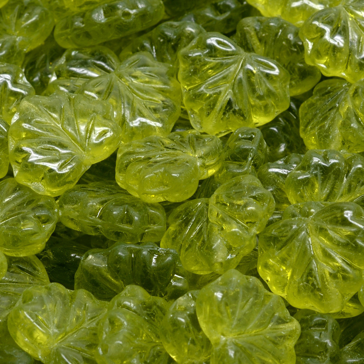 Czech glass wavy leaf beads 20pc translucent light green 14x9mm