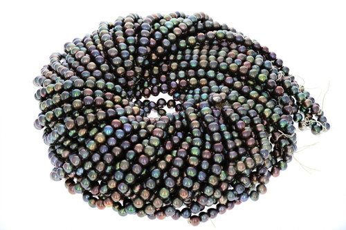 15 IN Strand 6.5-7 mm Peacock Potato Shaped Freshwater Pearls 15 IN Strand 6.5-7 mm Peacock Potato Shaped Freshwater Pearls