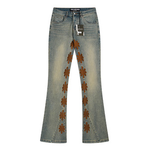 Vintage Olive Wash Flared Jeans with Brown Cross Appliqué