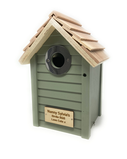 Handcrafted wooden bird barn feeder with engraved wooden message plate. Light beech wood roof with painted green front with stainless steel hole protector on front.